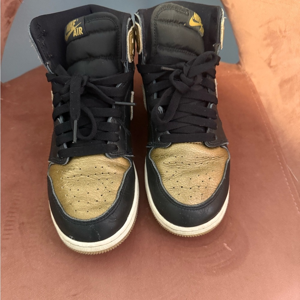 Jordan High-Top Sneakers in Black and Gold